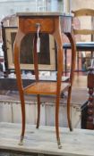 A Louis XV style marquetry inlaid brass mounted kingwood two tier table, width 25cm, depth 33cm,