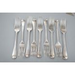 A set of nine George III silver Hanovarian pattern table forks, Eley & Fearn, London, 1804, 17oz.