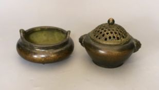 A Chinese bronze tripod censer and a Chinese bronze censer and cover 11cm