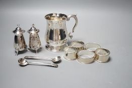 A George II silver baluster mug, John Payne, London, 1752, 97mm, together with five silver napkin