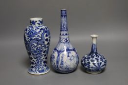 A Chinese blue and white ‘Dragon’ baluster vase and two blue and white bottle vases, 19th century