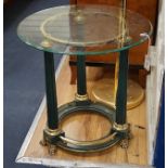 An Empire style circular brass mounted glass top occasional table, diameter 60cm, height 62cm