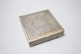 A Persian engraved white metal and niello cigarette box, stamped 84, 11.9cm, gross 12.5oz.