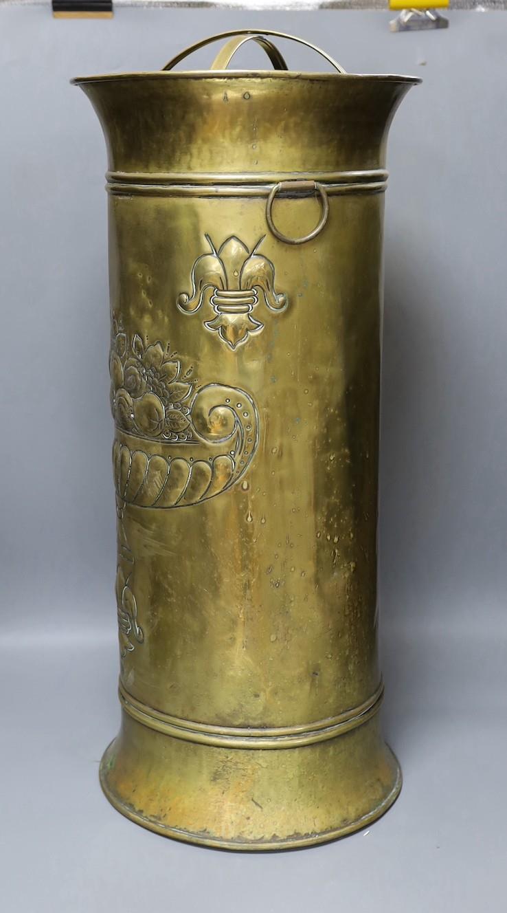 An embossed brass stick stand,66cms high. - Image 6 of 8