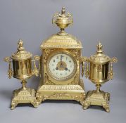 An early 20th century gilt brass three piece clock garniture 39cm