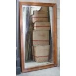 A provincial rectangular fruitwood bevelled wall mirror, width 90cm, height 152cm