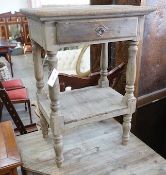 A 19th century style French provincial pine two tier side table, width 54cm, depth 37cm, height