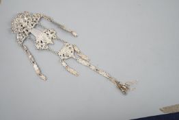 An Edwardian silver chatelaine, pierced and decorated with masks and scrolls, Nathan & Hayes,