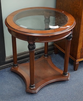 A pair of Empire style circular mahogany glass top occasional tables, larger diameter 60cm, height