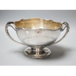 A George V silver two handled presentation pedestal bowl, with engraved inscription, Adie Bros.