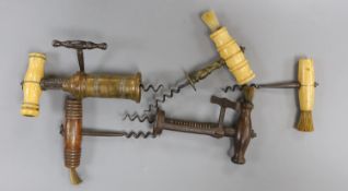 Three bone handled corkscrews and two other corkscrews including one by Lund, Cornhill