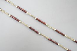 A 9ct and two colour enamelled baton link necklace, 52cm, gross 7.1 grams.