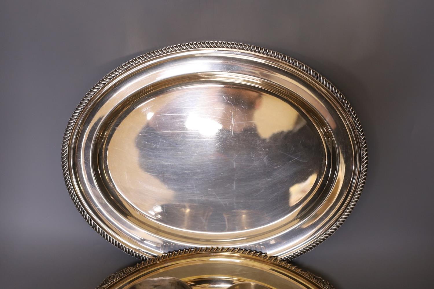 A silver plated tray, an oval plated serving dish and two silver plated mugs. Largest 41cm - Image 6 of 8