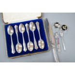 A cased set of six silver teaspoons, a silver bread knife, two 925 pill boxes, an 800 and enamel '