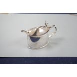 A late Victorian silver oval mustard pot, Stokers & Ireland Ltd, Chester, 1895, length 96mm.