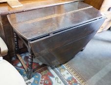 An 18th century oval oak gateleg dining table on bobbin underframe, 166cm extended, width 122cm,