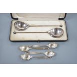 Four Georg Jensen sterling teaspoons, with Jensen box and a cased pair of continental white metal