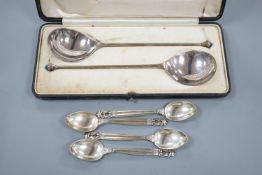 Four Georg Jensen sterling teaspoons, with Jensen box and a cased pair of continental white metal