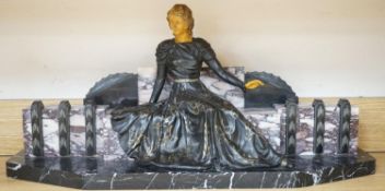 A large Art Deco style marble and spelter figural mantel ornament,74 cms wide.
