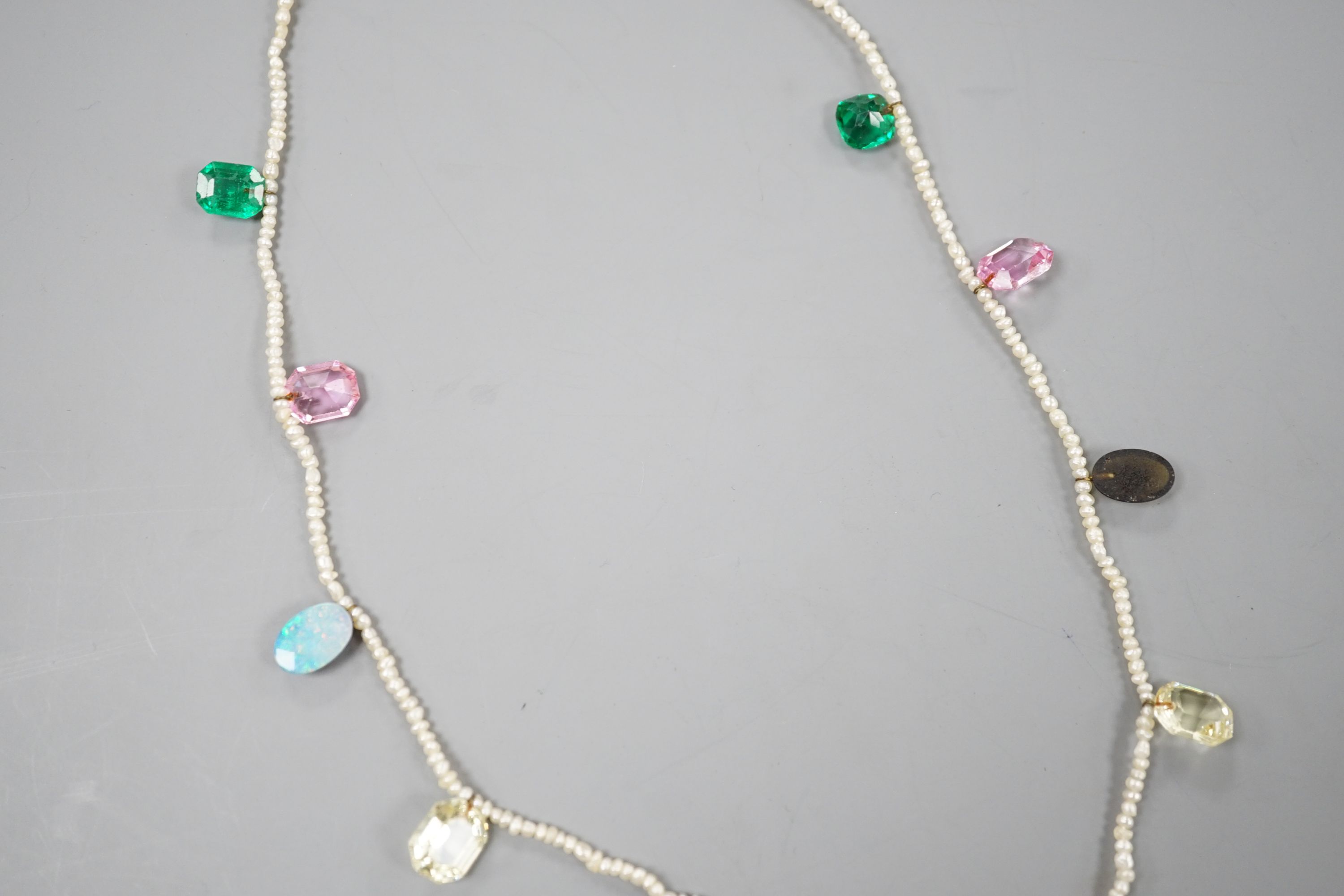 A multi coloured paste and opal doublet set baroque seed pearl necklace, 42cm. - Image 8 of 10