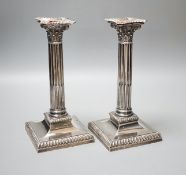 A pair of late Victorian silver Corinthian column candlesticks, Hawksworth, Eyre & Co, Sheffield,