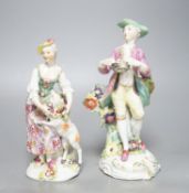 Two Derby porcelain figures of a gentleman holding a bird’s nest and a lady with a sheep, c.1760,