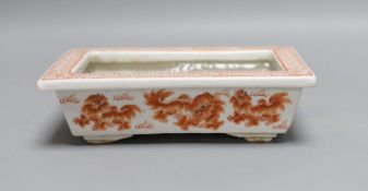 A Chinese rectangular iron red enamelled flower pot 19cm