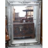 A Victorian style rectangular silvered wall mirror, width 86cm, height 118cm