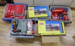 A large quantity of Hornby Dublo carriages, wagons and other rolling stock, much with original