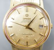 A gentleman's steel and gold plated Omega constellation automatic wrist watch, on an Omega gold