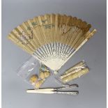 A mix collection of antique ivory to include needle cases, silver mounted gloves stretcher, etc