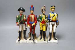 A set of four Continental porcelain models of soldiers,tallest 22 cms high.