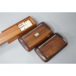 Two carved wood snuff boxes and a cased bone domino set
