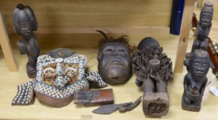 A group of Democratic Republic of Congo tribal carved wood figures and instrument and a Kuba style