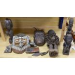 A group of Democratic Republic of Congo tribal carved wood figures and instrument and a Kuba style