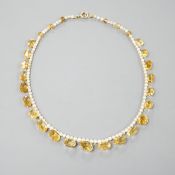 A single strand oval cut citrine and seed pearl set fringe necklace, with 9ct clasp, 44cm,