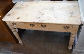 A Victorian pine two drawer side table, width 104cm, depth 52cm, height 72cm
