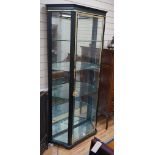 A brass mounted black painted display cabinet with interior lighting, width 92cm, depth 34cm, height