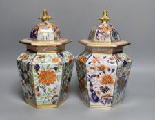 A pair of early 19th century Masons hexagonal ironstone jars and covers 24cm, impressed mark ‘Patent