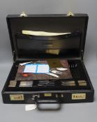 A Solingen parcel gilt cased, cutlery set.