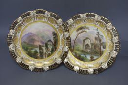 A pair of Coalport pierced border plates painted with named ruins scenes Airdale Abbey and Llanthony