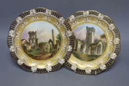 A pair of Coalport pierced border plates painted with named ruins scenes Ruins of Cathedral