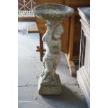 A reconstituted stone figural garden bird bath, height 89cm