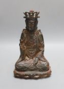 A Chinese Ming style bronze seated figure of Guanyin, 25cm