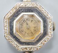 A lady's early 20th century white metal and diamond chip set manual wind octagonal cocktail watch,