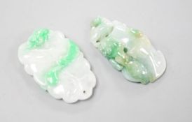 Two carved jade pendants, largest 45mm.