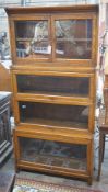 An early 20th century Globe Wernicke style oak four section glazed bookcase, width 87cm, depth 32cm,