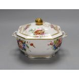 A Spode sugar box and cover of moulded form painted with flowers having a fruit finial, marked Spode