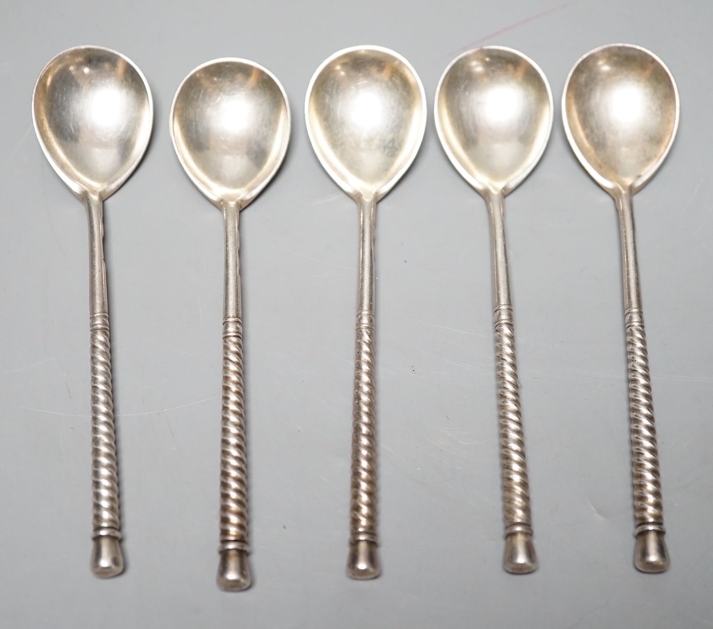 A set of five late 19th century Russian 84 zolotnik and niello spoons, 1875, 12.7cm, gross 135