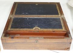 A Victorian rosewood veneered and brass strung writing slope, 43cm